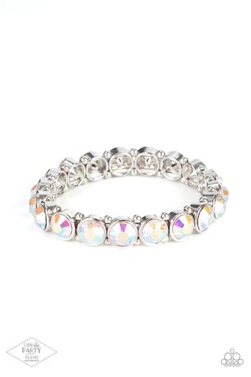 Infused with dainty silver beads, glittery iridescent rhinestone-encrusted frames are threaded along stretchy bands around the wrist for a glamorous look.  Sold as one individual bracelet.